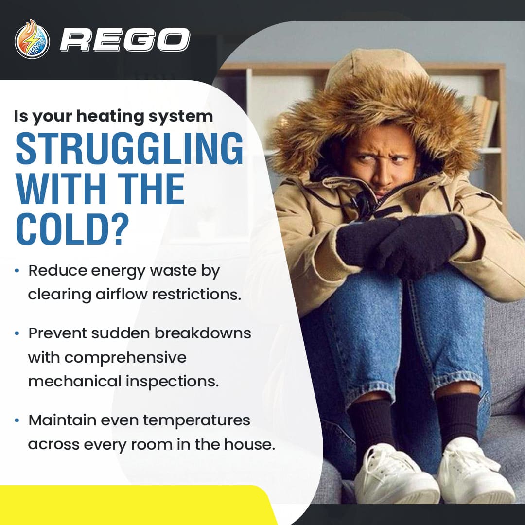 Homeowner sitting bundled up on couch due to heating system struggling with cold temperatures.